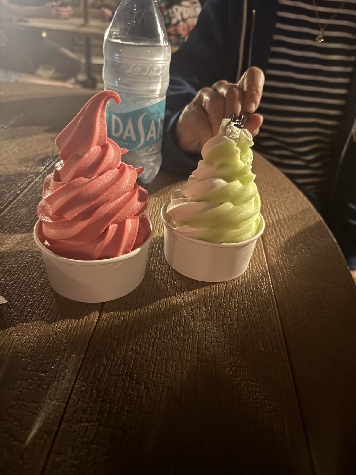 Two Dole Whip flavors in cups on a table