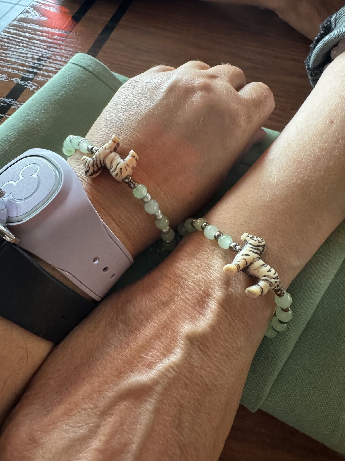 Matching zebra bead bracelets on Vanessa and her moms wrists